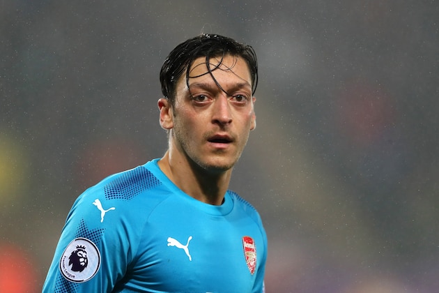SWANSEA, WALES - JANUARY 30:  Mesut Ozil of Arsenal looks on during the Premier League match between Swansea City and Arsenal at Liberty Stadium on January 30, 2018 in Swansea, Wales.  (Photo by Matthew Ashton - AMA/Getty Images)