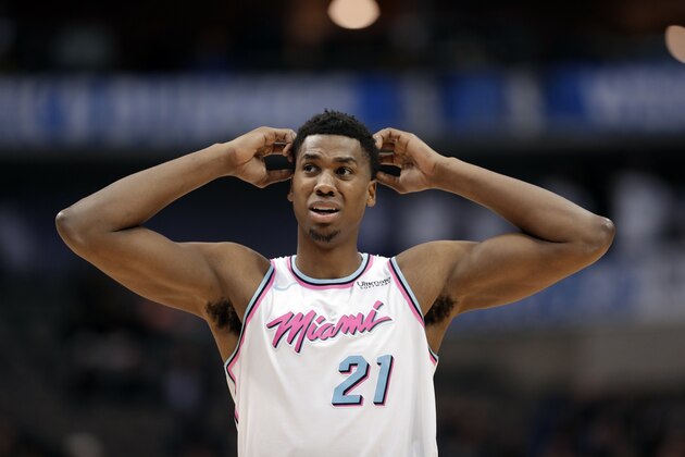 Miami Heat center Hassan Whiteside (21) looks up court after a foul was called against his team late in the second half of an NBA basketball game against the Dallas Mavericks on Monday, Jan. 29, 2018, in Dallas. (AP Photo/Tony Gutierrez)