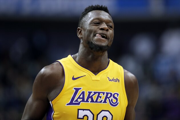 Los Angeles Lakers forward Julius Randle (30) celebrates a basket against the Dallas Mavericks in the second half of an NBA basketball game, Saturday, Jan. 13, 2018, in Dallas. (AP Photo/Tony Gutierrez)