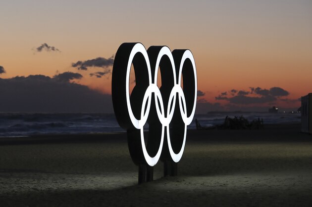 The Olympic Rings are placed at the beach before sunrise in Gangneung, South Korea, Wednesday, Jan. 24, 2018. Gangneung is the site of the coastal cluster which will host ice hockey, figure skating, speedskating, short track and curling for the 2018 Olympics. The 2018 Pyeongchang Games will be held from Feb. 9 to 25. (AP Photo/Lee Jin-man)