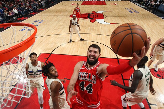 CHICAGO, IL - JANUARY 28: Nikola Mirotic #44 of the Chicago Bulls goes to the basket against the Milwaukee Bucks on January 28, 2018 at the United Center in Chicago, Illinois. NOTE TO USER: User expressly acknowledges and agrees that, by downloading and or using this Photograph, user is consenting to the terms and conditions of the Getty Images License Agreement. Mandatory Copyright Notice: Copyright 2018 NBAE (Photo by Gary Dineen/NBAE via Getty Images)