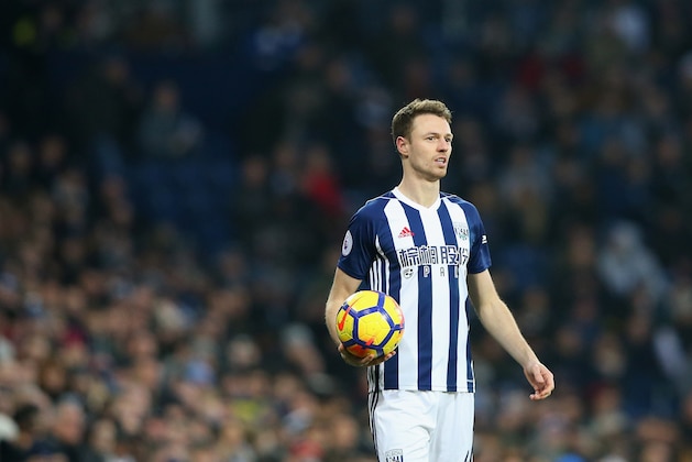WEST BROMWICH, ENGLAND - JANUARY 13:  Jonny Evans of West Bromwich Albion takes a throw in during the Premier League match between West Bromwich Albion and Brighton and Hove Albion at The Hawthorns on January 13, 2018 in West Bromwich, England.  (Photo by Alex Livesey/Getty Images)