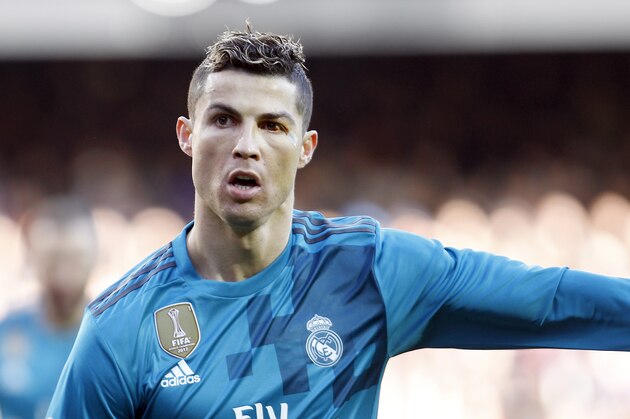 Real Madrid's Cristiano Ronaldo celebrates after scoring, during the Spanish La Liga soccer match between Valencia and Real Madrid at the Mestalla stadium in Valencia, Spain, Saturday, Jan. 27, 2018. (AP Photo/Alberto Saiz)