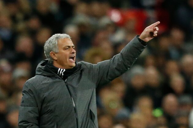 Manchester United's Portuguese manager Jose Mourinho gestures from the touchline during the English Premier League football match between Tottenham Hotspur and Manchester United at Wembley Stadium in London, on January 31, 2018. / AFP PHOTO / IKIMAGES / Ian KINGTON / RESTRICTED TO EDITORIAL USE. No use with unauthorized audio, video, data, fixture lists, club/league logos or 'live' services. Online in-match use limited to 45 images, no video emulation. No use in betting, games or single club/league/player publications.  /         (Photo credit should read IAN KINGTON/AFP/Getty Images)