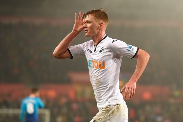 SWANSEA, WALES - JANUARY 30: Samuel Clucas of Swansea City celebrates scoring his sides third goal during the Premier League match between Swansea City and Arsenal at Liberty Stadium on January 30, 2018 in Swansea, Wales.  (Photo by Stu Forster/Getty Images)
