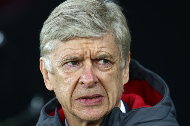 Arsenal's French manager Arsene Wenger arrives for the English Premier League football match between Swansea City and Arsenal at The Liberty Stadium in Swansea, south Wales on January 30, 2018. / AFP PHOTO / Geoff CADDICK / RESTRICTED TO EDITORIAL USE. No use with unauthorized audio, video, data, fixture lists, club/league logos or 'live' services. Online in-match use limited to 75 images, no video emulation. No use in betting, games or single club/league/player publications.  /         (Photo credit should read GEOFF CADDICK/AFP/Getty Images)