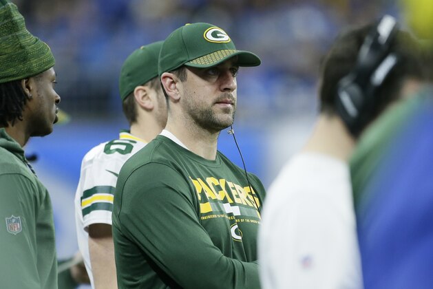 Green Bay Packers quarterback Aaron Rodgers watches from the sidelines during the second half of an NFL football game against the Detroit Lions, Sunday, Dec. 31, 2017, in Detroit. (AP Photo/Duane Burleson)