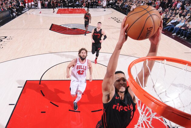 PORTLAND, OR - JANUARY 31: CJ McCollum #3 of the Portland Trail Blazers dunks against the Chicago Bulls on January 31, 2018 at the Moda Center in Portland, Oregon. NOTE TO USER: User expressly acknowledges and agrees that, by downloading and or using this Photograph, user is consenting to the terms and conditions of the Getty Images License Agreement. Mandatory Copyright Notice: Copyright 2018 NBAE (Photo by Sam Forencich/NBAE via Getty Images)