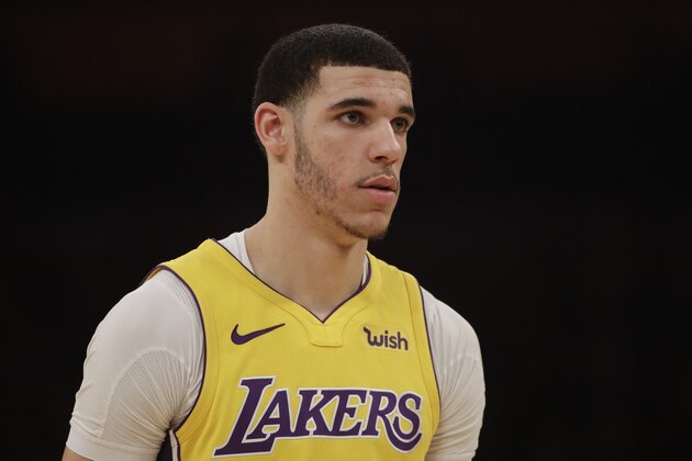 Los Angeles Lakers' Lonzo Ball walks on the court during the first half of an NBA basketball game against the San Antonio Spurs Thursday, Jan. 11, 2018, in Los Angeles. (AP Photo/Jae C. Hong)