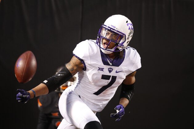 TCU wide receiver Kolby Listenbee (7) celebrates after a touchdown during an NCAA college football game between TCU and Oklahoma State in Stillwater, Okla., Saturday, Nov. 7, 2015. Oklahoma State won 49-29. (AP Photo/Sue Ogrocki)