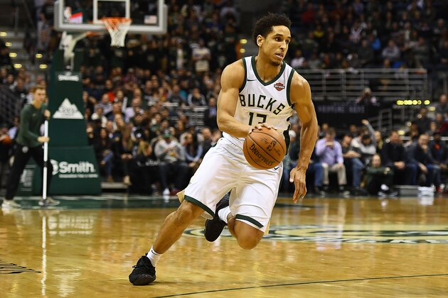 MILWAUKEE, WI - JANUARY 17:  Malcolm Brogdon #13 of the Milwaukee Bucks handles the ball during a game against the Miami Heat at the Bradley Center on January 17, 2018 in Milwaukee, Wisconsin.  NOTE TO USER: User expressly acknowledges and agrees that, by downloading and or using this photograph, User is consenting to the terms and conditions of the Getty Images License Agreement.  (Photo by Stacy Revere/Getty Images)