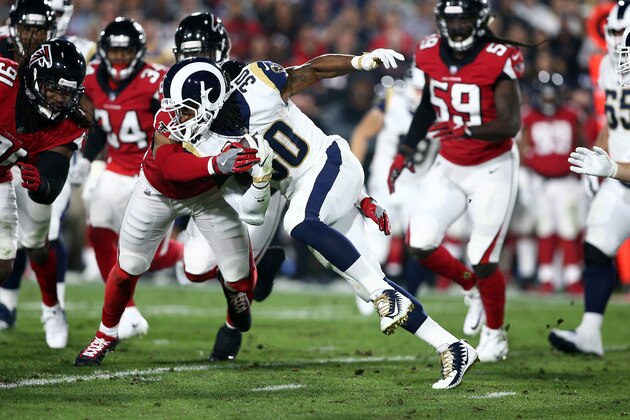 LOS ANGELES, CA - JANUARY 06:  Todd Gurley #30 of the Los Angeles Rams runs the ball down field during the NFC Wild Card Playoff Game against the Atlanta Falcons at the Los Angeles Coliseum on January 6, 2018 in Los Angeles, California.  (Photo by Sean M. Haffey/Getty Images)