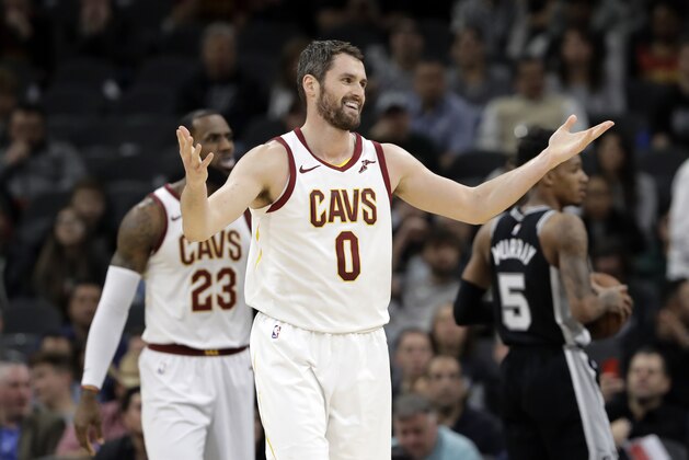 Cleveland Cavaliers forward Kevin Love (0) reacts after he was called for a personal foul during the first half of an NBA basketball game against the San Antonio Spurs, Tuesday, Jan. 23, 2018, in San Antonio. (AP Photo/Eric Gay)