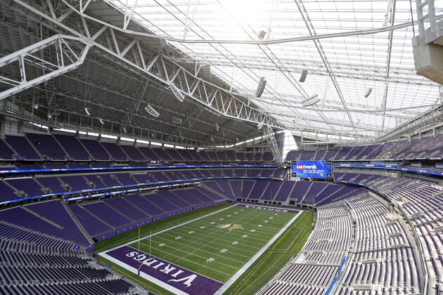 US Bank stadium and team officials hosted a media tour of the new home of the Minnesota Vikings NFL football team Tuesday, July 19, 2016, in Minneapolis. The Vikings will open their 2016 season in the $1.1 billion facility. Sunlight will bathe the field through the partial transparent roof. (AP Photo/Jim Mone)