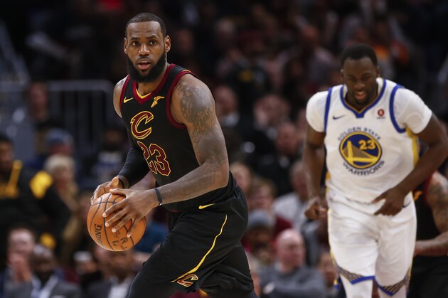 CLEVELAND, OH - JANUARY 15: LeBron James #23 of the Cleveland Cavaliers brings the ball up court during the game against the Golden State Warriors at Quicken Loans Arena on January 15, 2018 in Cleveland, Ohio. NOTE TO USER: User expressly acknowledges and agrees that, by downloading and or using this photograph, User is consenting to the terms and conditions of the Getty Images License Agreement.(Photo by Michael Hickey/Getty Images)