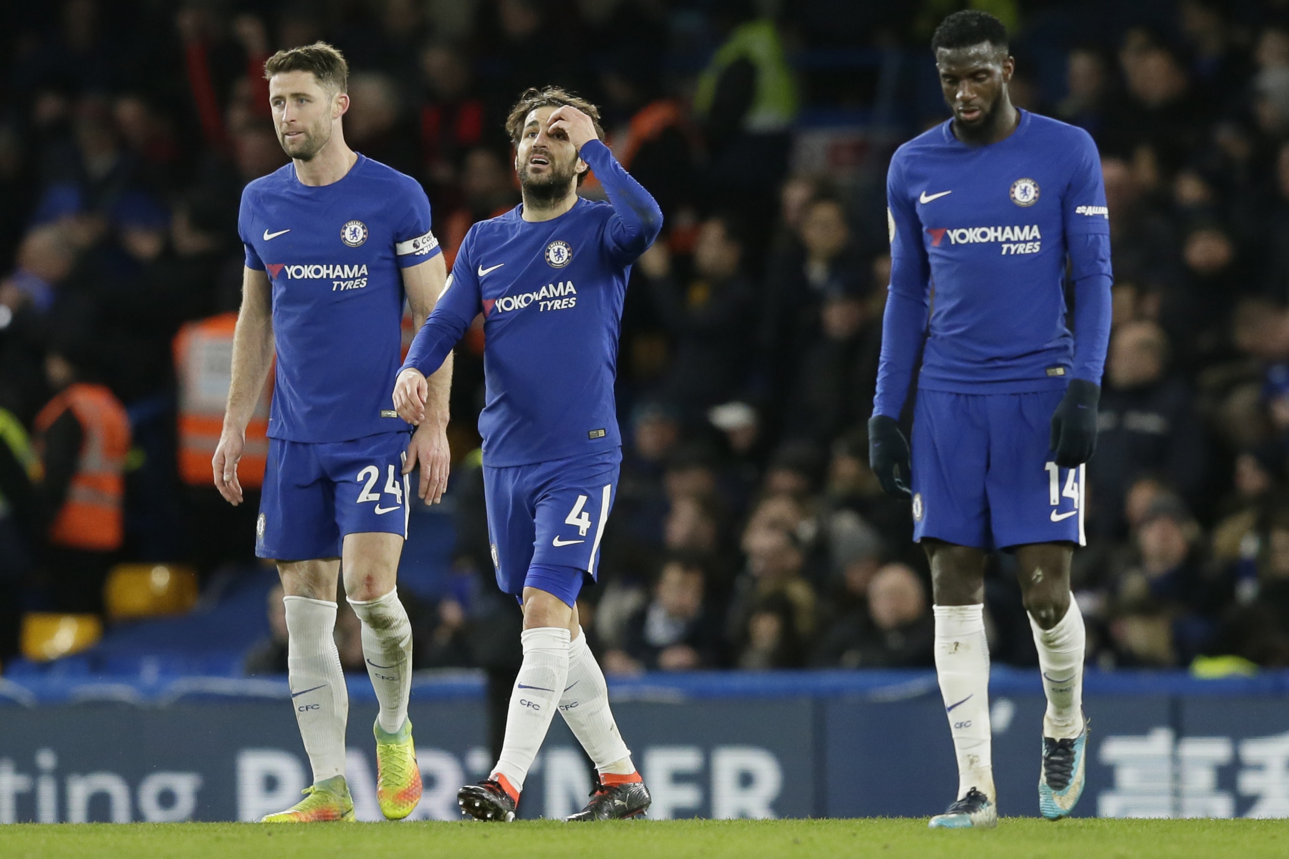 Chelsea's Cesc Fabregas, centre, Gary Cahill, left, and Tiemoue Bakayoko look dejected after Bournemouth's third goal during the English Premier League soccer match between Chelsea and Bournemouth at Stamford Bridge in London, Wednesday Jan. 31, 2018. (AP Photo/Tim Ireland) Chelsea's Cesc Fabregas, centre, Gary Cahill, left, and Tiemoue Bakayoko look dejected after Bournemouth's third goal during the English Premier League soccer match between Chelsea and Bournemouth at Stamford Bridge in London, Wednesday Jan. 31, 2018. (AP Photo/Tim Ireland)