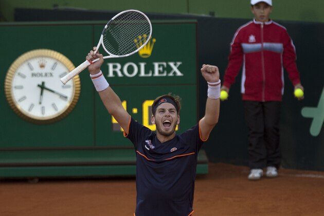 British Cameron Norrie celebrates after winning against Spain's Roberto Bautista during the first round of the Davis Cup tennis match between Spain and Great Britain at the Puente Romano tennis club in Marbella, on February 02, 2018. / AFP PHOTO / JORGE GUERRERO        (Photo credit should read JORGE GUERRERO/AFP/Getty Images)