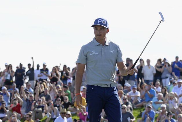 SCOTTSDALE, AZ - FEBRUARY 02:  Rickie Fowler makes a birdie putt on the 10th hole during the second round of the Waste Management Phoenix Open at TPC Scottsdale on February 2, 2018 in Scottsdale, Arizona.  (Photo by Robert Laberge/Getty Images)