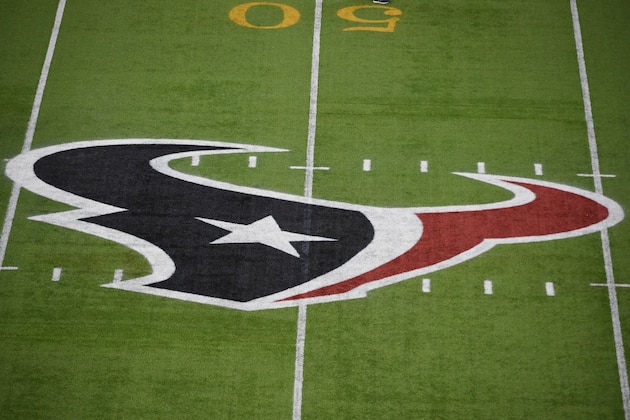 The Houston Texans logo is seen of the field at NRG Stadium before an NFL football game against the Tennessee Titans, Sunday, Nov. 1, 2015, in Houston. (AP Photo/Eric Christian Smith)
