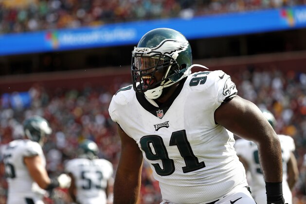 Philadelphia Eagles defensive tackle Fletcher Cox celebrates after officials reviewed and confirmed a play in which Washington Redskins quarterback Kirk Cousins fumbled and Cox recovered and scored a touchdown in the second half of an NFL football game, Sunday, Sept. 10, 2017, in Landover, Md. Philadelphia won 30-17. (AP Photo/Alex Brandon)