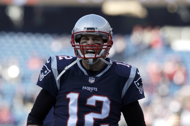 New England Patriots quarterback Tom Brady (12) warms up before the AFC championship NFL football game against the Jacksonville Jaguars, Sunday, Jan. 21, 2018, in Foxborough, Mass. (AP Photo/Charles Krupa)
