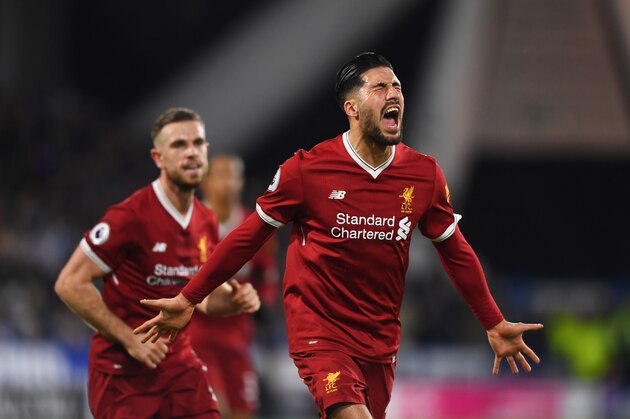 HUDDERSFIELD, ENGLAND - JANUARY 30:  Emre Can of Liverpool (R) celebrates as he scores their first goal with Jordan Henderson during the Premier League match between Huddersfield Town and Liverpool at John Smith's Stadium on January 30, 2018 in Huddersfield, England.  (Photo by Gareth Copley/Getty Images)