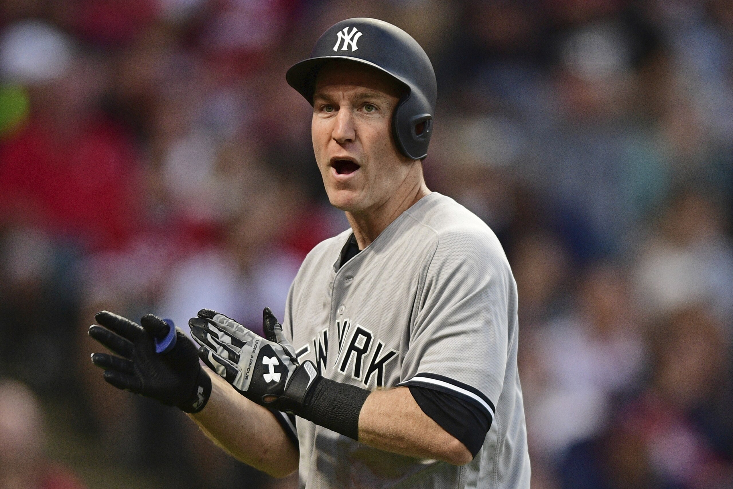 New York Yankees' Todd Frazier celebrates after hitting a solo home run off Cleveland Indians starting pitcher Trevor Bauer in the fifth inning of a baseball game, Friday, Aug. 4, 2017, in Cleveland. (AP Photo/David Dermer)