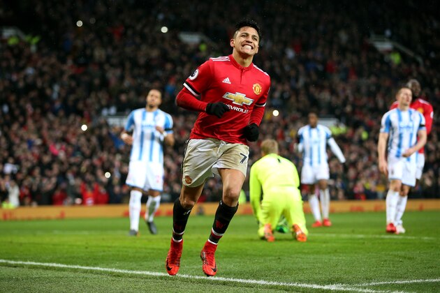 MANCHESTER, ENGLAND - FEBRUARY 03:  Alexis Sanchez of Manchester United celebrates after scoring his sides second goal during the Premier League match between Manchester United and Huddersfield Town at Old Trafford on February 3, 2018 in Manchester, England.  (Photo by Alex Morton/Getty Images)