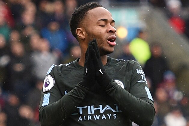 Manchester City's English midfielder Raheem Sterling reacts during the English Premier League football match between Burnley and Manchester City at Turf Moor in Burnley, north west England on February 3, 2018. / AFP PHOTO / Oli SCARFF / RESTRICTED TO EDITORIAL USE. No use with unauthorized audio, video, data, fixture lists, club/league logos or 'live' services. Online in-match use limited to 75 images, no video emulation. No use in betting, games or single club/league/player publications.  /         (Photo credit should read OLI SCARFF/AFP/Getty Images)