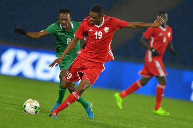 Nigeria's Abdullahi Musa (green) vies for the ball with Sudan's Mohamed Ahmed Bashir Abdellh (red) duringtheir African Nations Championship semifinal match at Marrakech Stadium on January 31, 2018, in Marrakech. / AFP PHOTO / STR        (Photo credit should read STR/AFP/Getty Images)