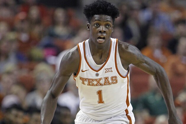 FILE - In this March 4, 2017, file photo, Texas guard Andrew Jones dribbles the ball during the second half of an NCAA college basketball game against Baylor, in Austin, Texas. Texas announced, Wednesday, Jan. 10, 2018, that sophomore guard Andrew Jones has leukemia and has started treatment. Jones was the Longhorns leading scorer before he was sidelined by a broken wrist. He played sparingly in his return after complaining of low energy and was sent for tests. (AP Photo/Michael Thomas, File)