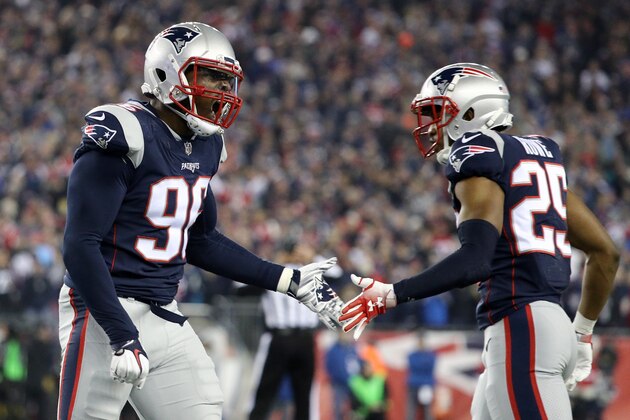 FOXBOROUGH, MA - JANUARY 21: Geneo Grissom #96 and Eric Rowe #25 of the New England Patriots celebrate after a play in the second half against the Jacksonville Jaguars during the AFC Championship Game at Gillette Stadium on January 21, 2018 in Foxborough, Massachusetts.  (Photo by Maddie Meyer/Getty Images)