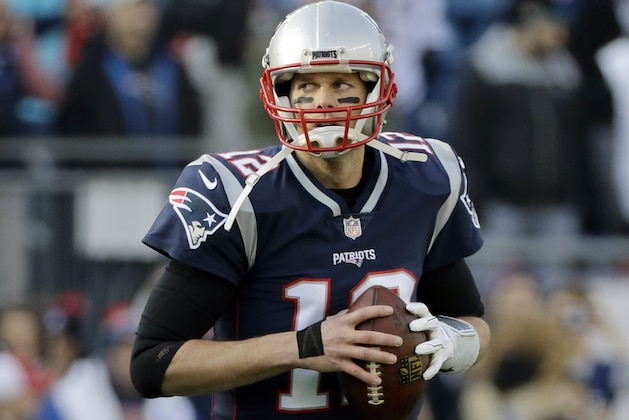 New England Patriots quarterback Tom Brady warms up before the AFC championship NFL football game against the Jacksonville Jaguars, Sunday, Jan. 21, 2018, in Foxborough, Mass. (AP Photo/David J. Phillip)