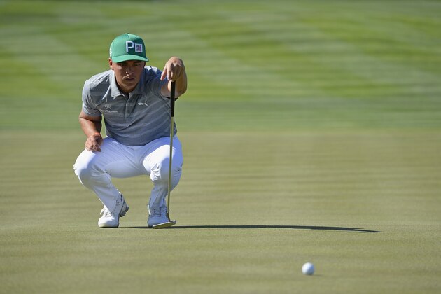 SCOTTSDALE, AZ - FEBRUARY 03:  Rickie Fowler lines up a putt on the fifth hole during the third round of the Waste Management Phoenix Open at TPC Scottsdale on February 3, 2018 in Scottsdale, Arizona.  (Photo by Robert Laberge/Getty Images)