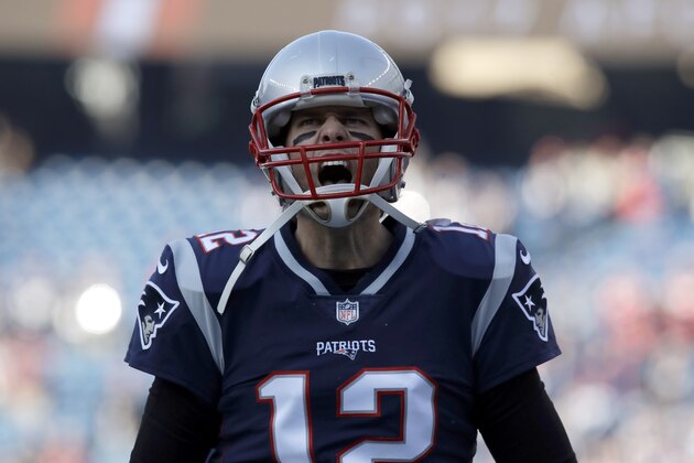 New England Patriots quarterback Tom Brady (12) warms up before the AFC championship NFL football game against the Jacksonville Jaguars, Sunday, Jan. 21, 2018, in Foxborough, Mass. (AP Photo/Charles Krupa)