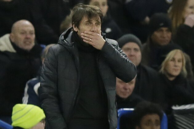 Chelsea manager Antonio Conte, right, looks dejected after Bournemouth's second goal during the English Premier League soccer match between Chelsea and Bournemouth at Stamford Bridge in London, Wednesday Jan. 31, 2018. (AP Photo/Tim Ireland)