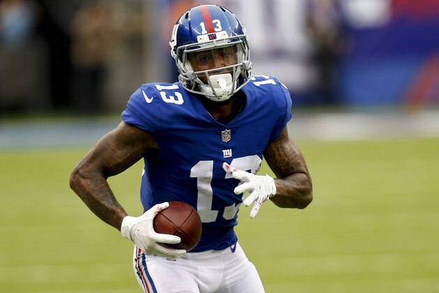 EAST RUTHERFORD, NJ - OCTOBER 08:  Odell Beckham #13 of the New York Giants runs in for a touchdown  during their game against Los Angeles Chargers at MetLife Stadium on October 8, 2017 in East Rutherford, New Jersey. (Photo by Jeff Zelevansky/Getty Images)