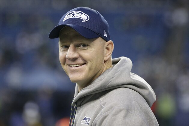 Seattle Seahawks offensive coordinator Darrell Bevell walks on the field before an NFL football game against the Philadelphia Eagles, Sunday, Dec. 3, 2017, in Seattle. (AP Photo/Ted S. Warren)