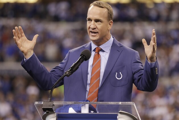 Former Indianapolis Colts quarterback Peyton Manning speaks during a halftime ceremony at an NFL football game between the Colts and the San Francisco 49ers, Sunday, Oct. 8, 2017, in Indianapolis. The Colts retired Manning's jersey during the ceremony. (AP Photo/Darron Cummings)