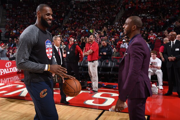 HOUSTON, TX - NOVEMBER 9:  Chris Paul #3 of the Houston Rockets talks with LeBron James #23 of the Cleveland Cavaliers on NOVEMBER 9, 2017 at the Toyota Center in Houston, Texas. NOTE TO USER: User expressly acknowledges and agrees that, by downloading and or using this photograph, User is consenting to the terms and conditions of the Getty Images License Agreement. Mandatory Copyright Notice: Copyright 2017 NBAE (Photo by Bill Baptist/NBAE via Getty Images)
