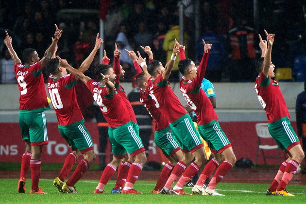 Morocco's football players celebrate after scoring their second goal during the final football match of the African Nations Championship between Morocco and Nigeria at the Mohammed V Casablanca Stadium on February 4, 2018. / AFP PHOTO / FADEL SENNA        (Photo credit should read FADEL SENNA/AFP/Getty Images)