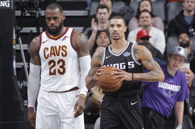 SACRAMENTO, CA - DECEMBER 27: George Hill #3 of the Sacramento Kings holds onto the ball against the Cleveland Cavaliers on December 27, 2017 at Golden 1 Center in Sacramento, California. NOTE TO USER: User expressly acknowledges and agrees that, by downloading and or using this photograph, User is consenting to the terms and conditions of the Getty Images Agreement. Mandatory Copyright Notice: Copyright 2017 NBAE (Photo by Rocky Widner/NBAE via Getty Images)