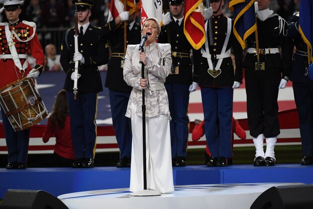 Recording artist Pink sings the US National Anthem before the start of Super Bowl LII between the Philadelphia Eagles and the New England Patriots at US Bank Stadium on February 4, 2018 in Minneapolis, Minnesota. / AFP PHOTO / TIMOTHY A. CLARY        (Photo credit should read TIMOTHY A. CLARY/AFP/Getty Images)