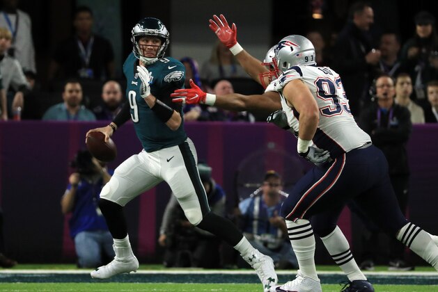 MINNEAPOLIS, MN - FEBRUARY 04:  Nick Foles #9 of the Philadelphia Eagles looks to pass the ball against Lawrence Guy #93 of the New England Patriots  during the second quarter in Super Bowl LII at U.S. Bank Stadium on February 4, 2018 in Minneapolis, Minnesota.  (Photo by Mike Ehrmann/Getty Images)