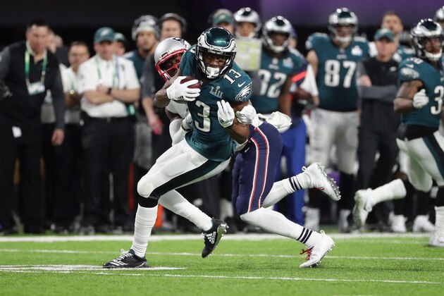 MINNEAPOLIS, MN - FEBRUARY 04:  Nelson Agholor #13 of the Philadelphia Eagles carries the ball defended by Johnson Bademosi #29 of the New England Patriots in the third quarter of Super Bowl LII at U.S. Bank Stadium on February 4, 2018 in Minneapolis, Minnesota.  (Photo by Elsa/Getty Images)