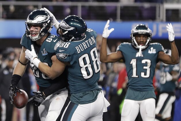 Philadelphia Eagles' Zach Ertz, left, celebrates his touchdown catch during the second half of the NFL Super Bowl 52 football game against the New England Patriots Sunday, Feb. 4, 2018, in Minneapolis. (AP Photo/Mark Humphrey)