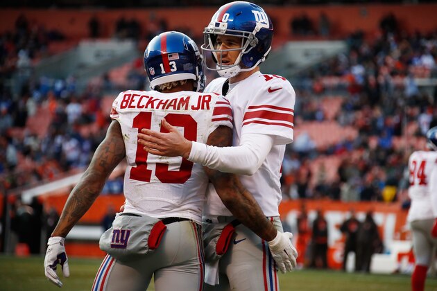 CLEVELAND, OH - NOVEMBER 27:  Odell Beckham #13 of the New York Giants celebrates his touchdown with Eli Manning #10 during the fourth quarter against the Cleveland Browns at FirstEnergy Stadium on November 27, 2016 in Cleveland, Ohio. (Photo by Gregory Shamus/Getty Images)
