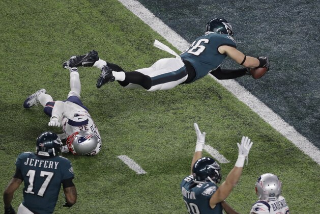 Philadelphia Eagles tight end Zach Ertz scores past New England Patriots free safety Devin McCourty during the second half of the NFL Super Bowl 52 football game Sunday, Feb. 4, 2018, in Minneapolis. (AP Photo/Eric Gay)