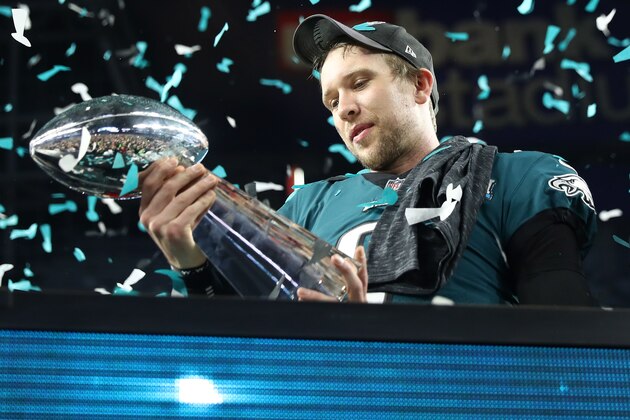 MINNEAPOLIS, MN - FEBRUARY 04:  Nick Foles #9 of the Philadelphia Eagles celebrates with the Vince Lombardi Trophy after defeating the New England Patriots 41-33 in Super Bowl LII at U.S. Bank Stadium on February 4, 2018 in Minneapolis, Minnesota.  (Photo by Elsa/Getty Images)