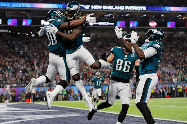 MINNEAPOLIS, MN - FEBRUARY 04:  Corey Clement #30 of the Philadelphia Eagles is congratulated by his teammate Jay Ajayi #36 after his 22-yard touchdown reception against the New England Patriots in the third quarter of Super Bowl LII at U.S. Bank Stadium on February 4, 2018 in Minneapolis, Minnesota.  (Photo by Kevin C. Cox/Getty Images)